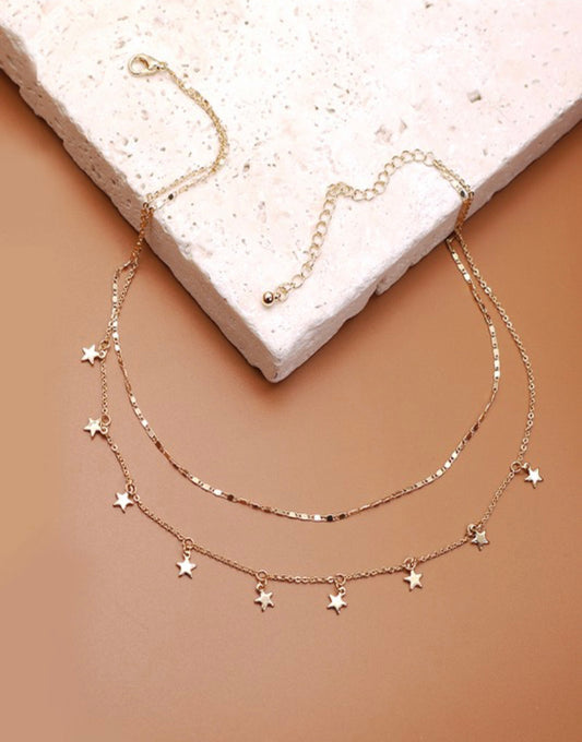 Gold star necklace
